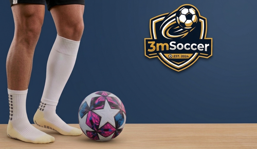 Person wearing soccer cleats and socks with a colorful soccer ball on a wooden surface, featuring the 3mSoccer logo.